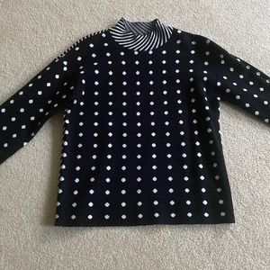 Fun long sleeve sweater. Polka dots on front. Stripes on back.